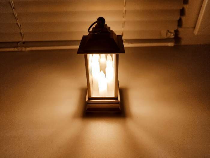 Фотография покупателя товара Светодиодная фигура «Золотистый фонарь со свечками» 5.5 × 13 × 5.5 см, пластик, батарейки AG13х3, свечение тёплое белое - Фото 1