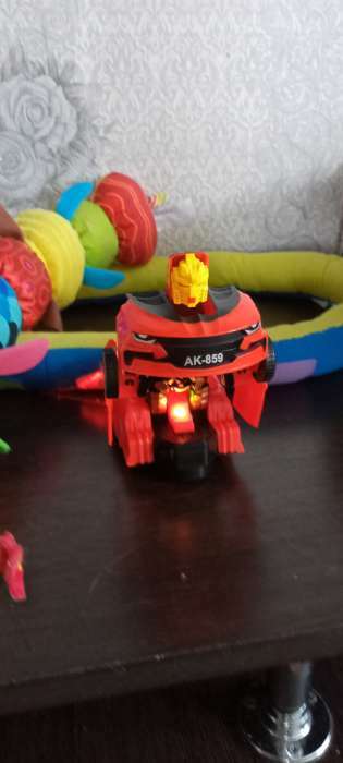 Фотография покупателя товара Робот-игрушка «Автобот», трансформируется, световые эффекты, русская озвучка, работает от батареек - Фото 7