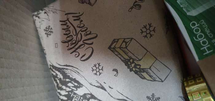 Фотография покупателя товара Бумага упаковочная крафт бурый " Снежная деревня", 70 х 100 см,1 лист