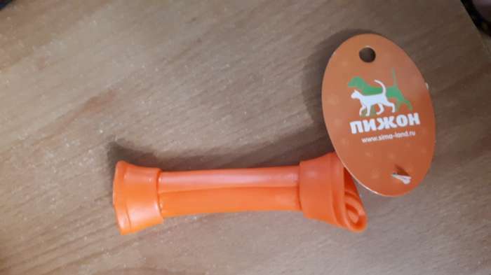 Фотография покупателя товара Игрушка пищащая "Кость-лакомство" для собак, 13 см, оранжевая