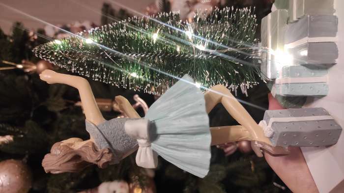 Фотография покупателя товара Сувенир полистоун световой "Девушка украшает ёлочку" 24,5х11х15 см - Фото 1