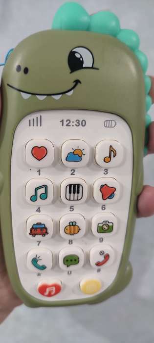 Фотография покупателя товара Музыкальная игрушка «Милый дракончик», звук, цвет зелёный - Фото 2