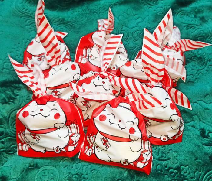 Фотография покупателя товара Мешок подарочный с ушками «Новогодний котик», 12 × 11.5 см - Фото 1