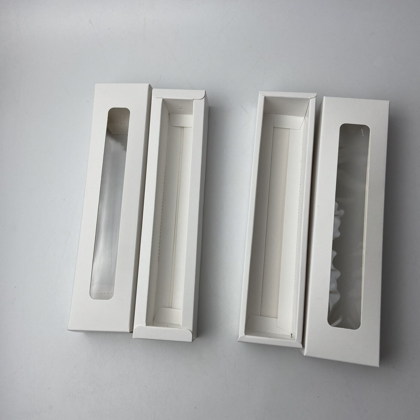 Фотография покупателя товара Коробка для 5 конфет с окном, с тонкими разделителями, белый 21×5.5×3.3 см - Фото 13