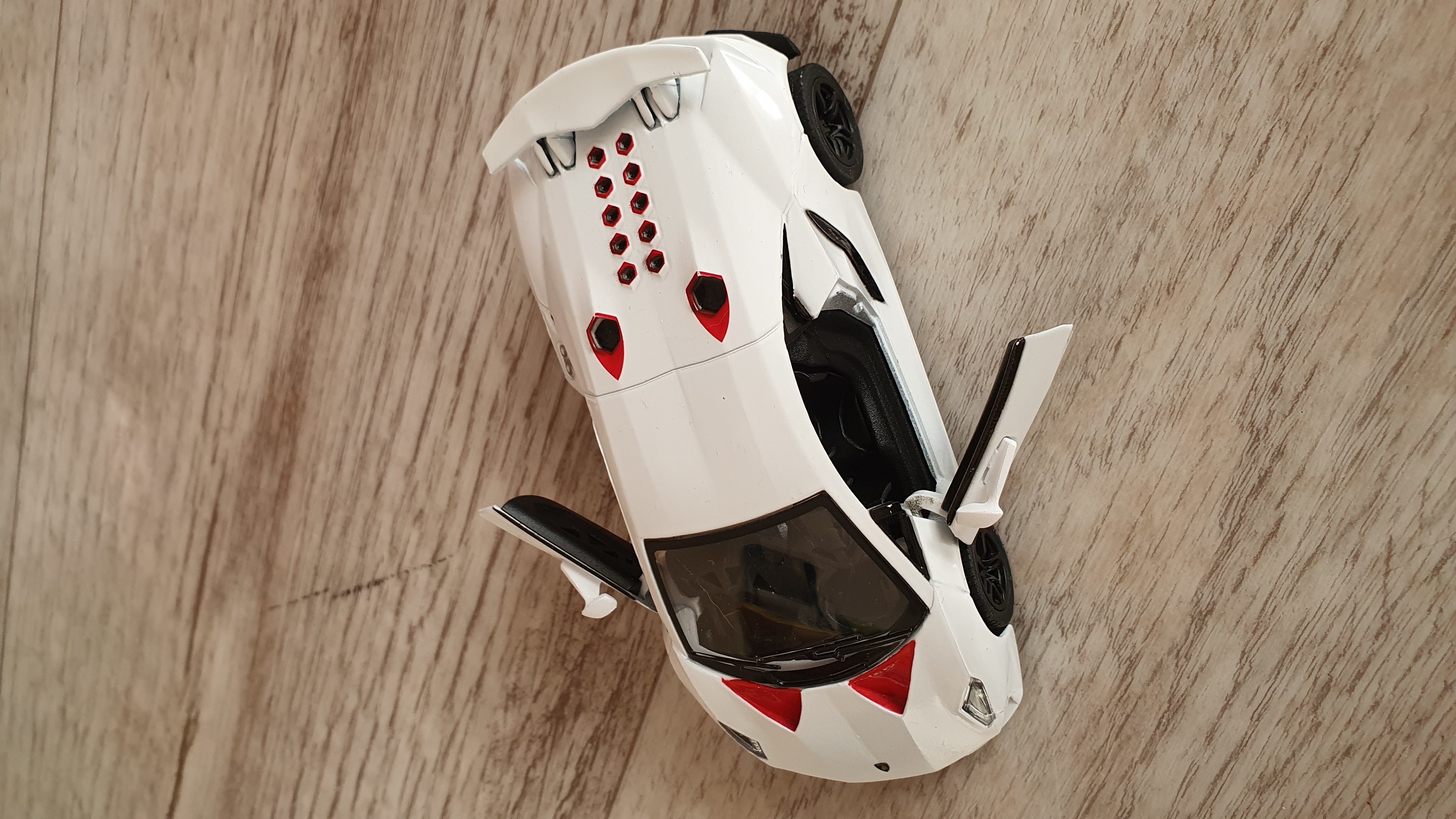 Фотография покупателя товара Машина металлическая Lamborghini Sesto Elemento, 1:38, открываются двери, инерция, цвет синий - Фото 1