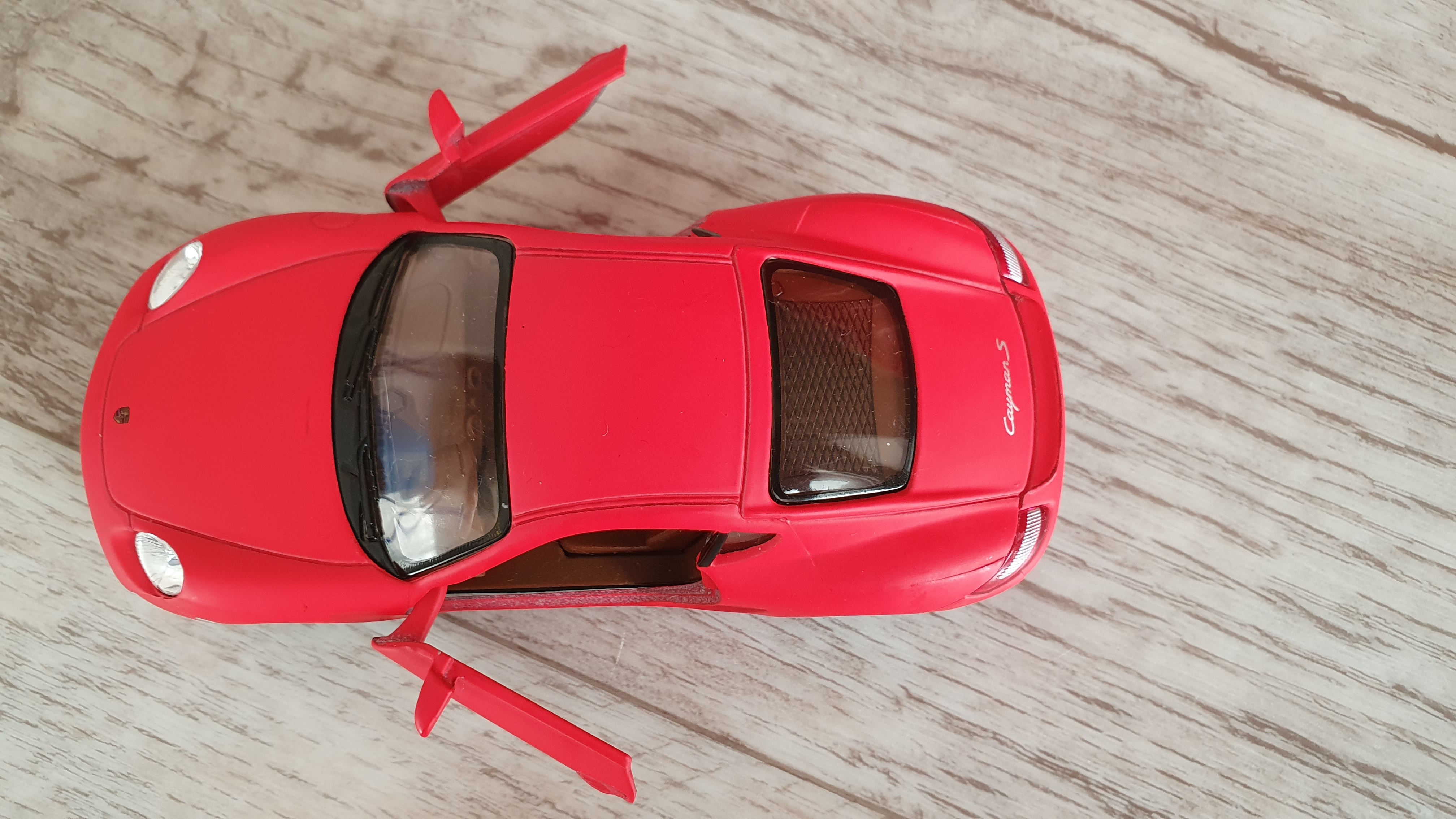 Фотография покупателя товара Машина металлическая Porsche Matte Series, 1:36, открываются двери, инерция, цвет красный матовый - Фото 2