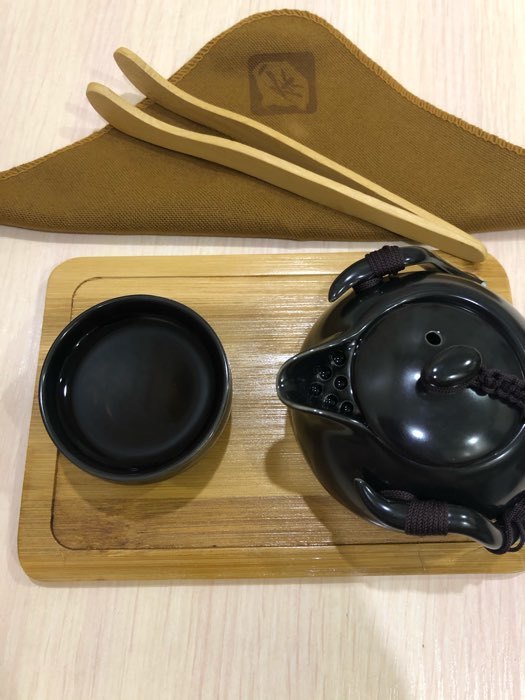 Фотография покупателя товара Набор для чайной церемонии керамический «Тясицу», 8 предметов: чайник 120 мл, 4 пиалы 50 мл, салфетка, щипцы, подставка - Фото 3