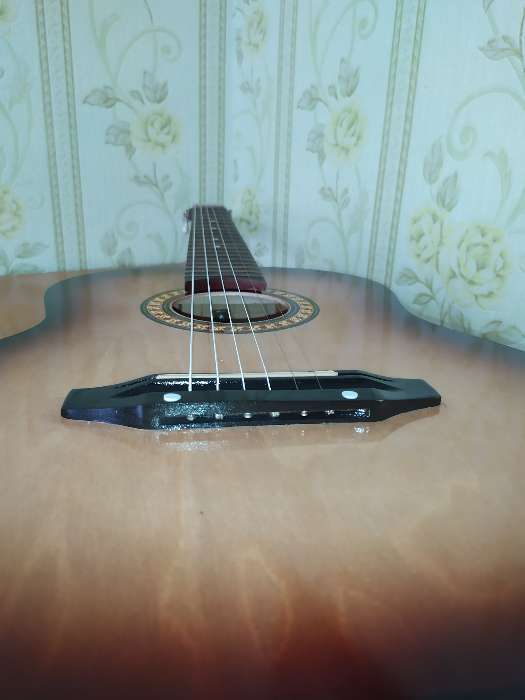Фотография покупателя товара Акустическая гитара 6-ти струнная, менз. 650мм., струны металл, головка с пазами - Фото 2