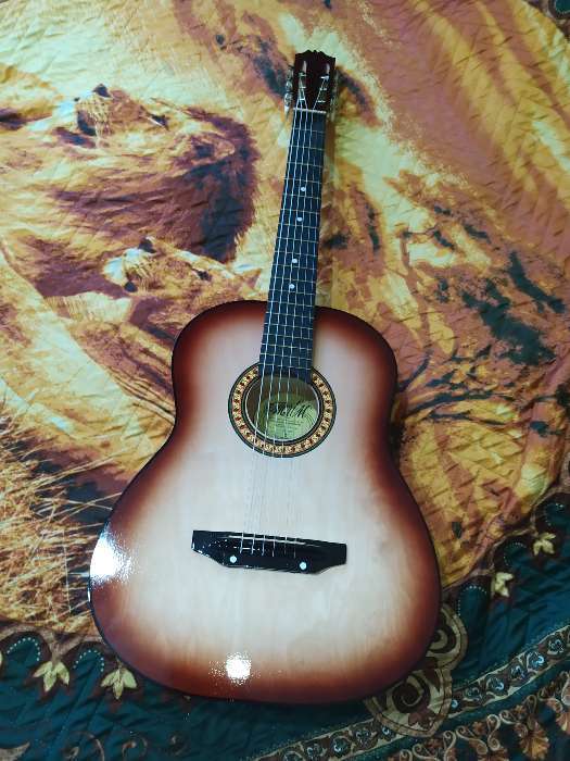 Фотография покупателя товара Акустическая гитара 6-ти струнная, менз. 650мм., струны металл, головка с пазами - Фото 5