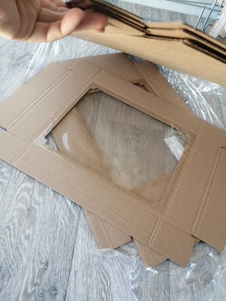 Фотография покупателя товара Коробка сборная без печати крышка-дно бурая с окном 29 х 23,5 х 6 см