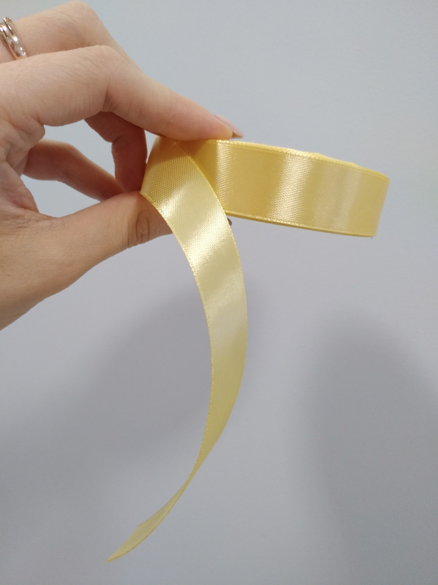 Фотография покупателя товара Лента атласная, 20 мм × 23 ± 1 м, цвет мягкий жёлтый №101