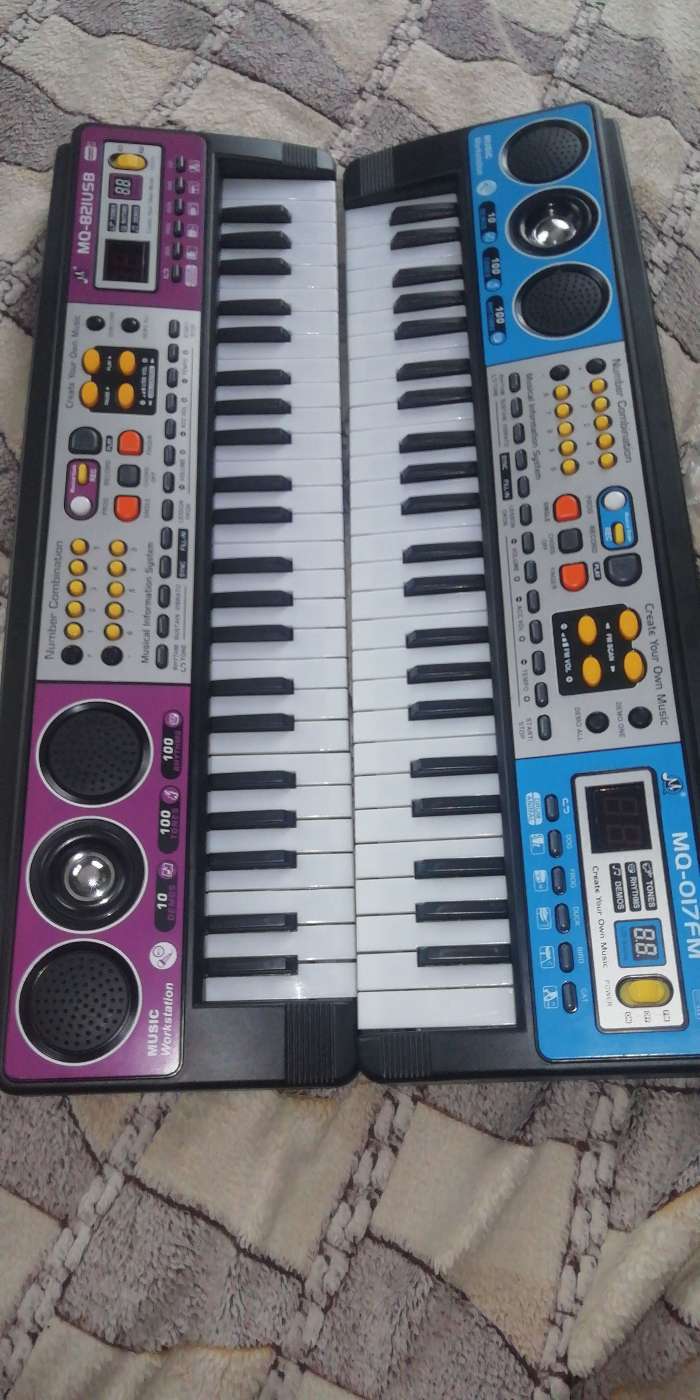 Фотография покупателя товара Синтезатор «Музыкальный взрыв», 49 клавиш с радио, работает от батареек - Фото 1