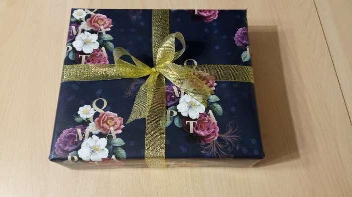 Фотография покупателя товара Бумага упаковочная глянцевая «8 марта», 70 х 100 см - Фото 1