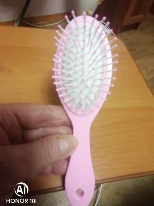 Фотография покупателя товара Расчёска массажная «Единорог», 5.5×17.5±1 см, МИКС - Фото 2