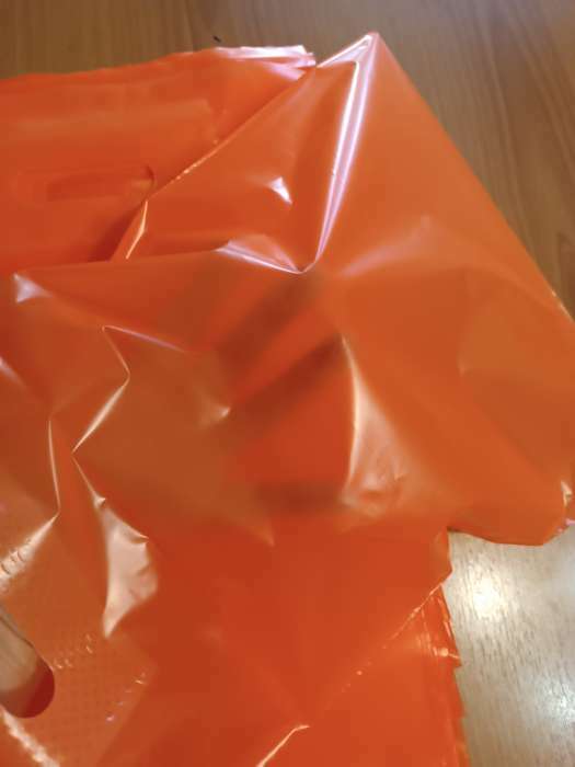 Фотография покупателя товара Пакет полиэтиленовый с вырубной усиленной ручкой, Кислотно - оранжевый 30 х 40 см, 50 мкм - Фото 1