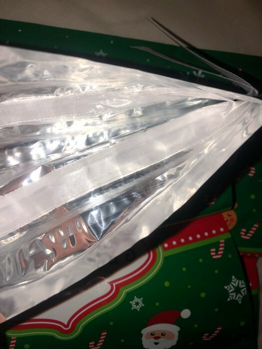 Фотография покупателя товара Пакет подарочный с завязками, "Счастливого рождества", 24х32 см - Фото 4