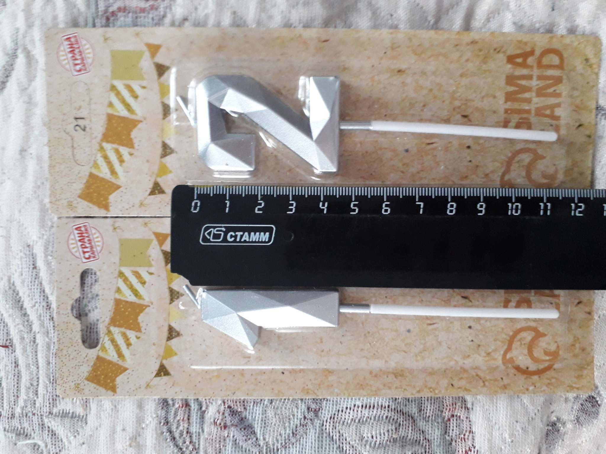 Фотография покупателя товара Свеча в торт на шпажке «Алмаз», цифра "1", серебряная, 4,8х2,6 см