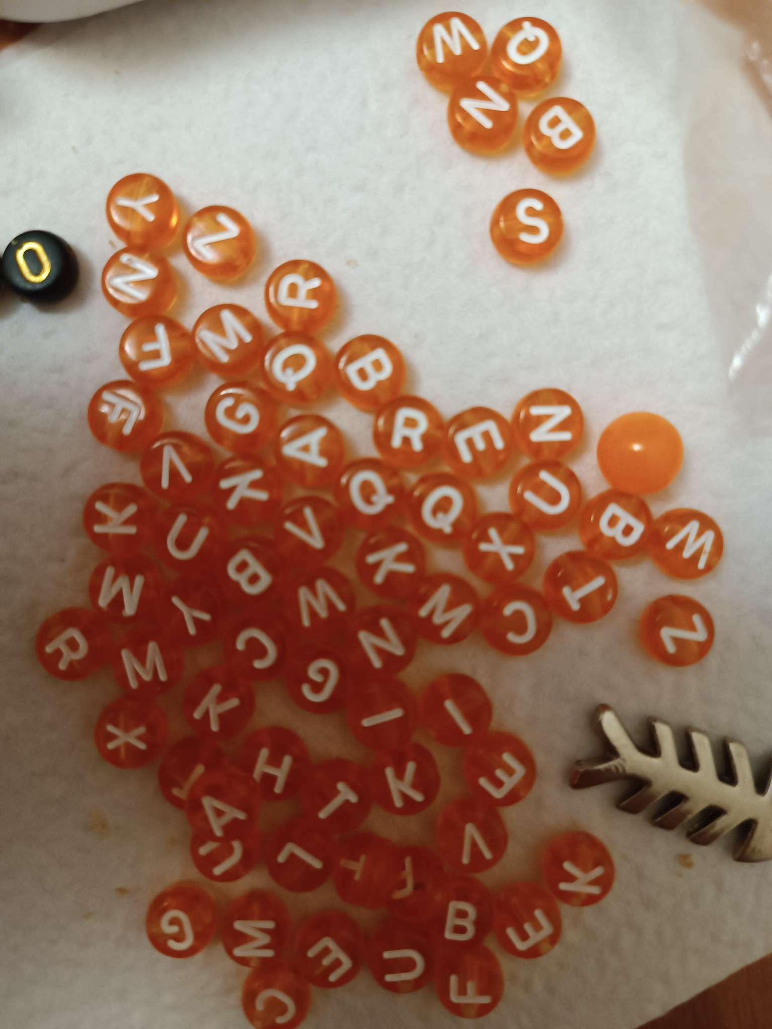 Фотография покупателя товара Бусина из акрила «Буквы английские» МИКС, 7×4 мм, набор 10 г, цвет прозрачно-оранжевый