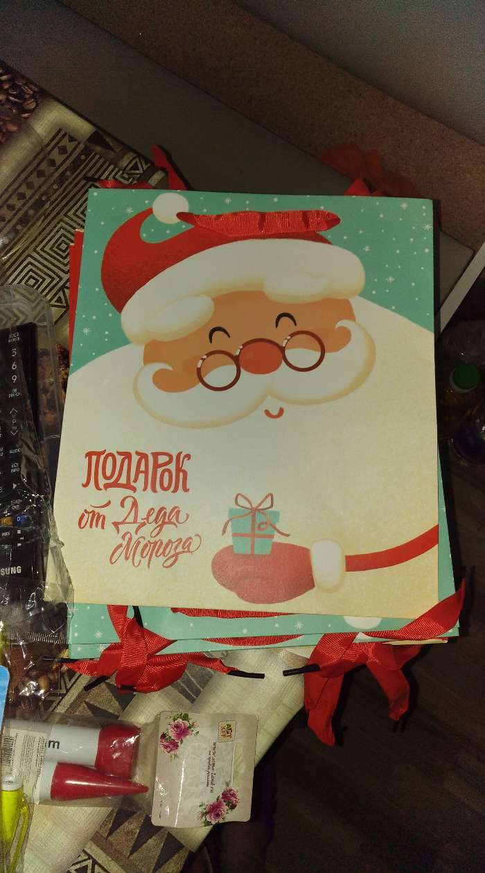 Фотография покупателя товара Пакет ламинированный вертикальный «Подарок от Деда Мороза», ML 23 × 27 × 11,5 см