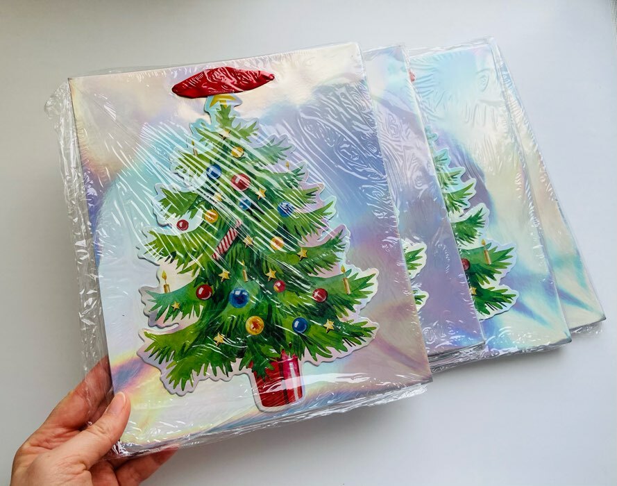 Фотография покупателя товара Пакет голографический вертикальный «Новогодняя ёлочка», 25 × 21 × 10 см - Фото 1