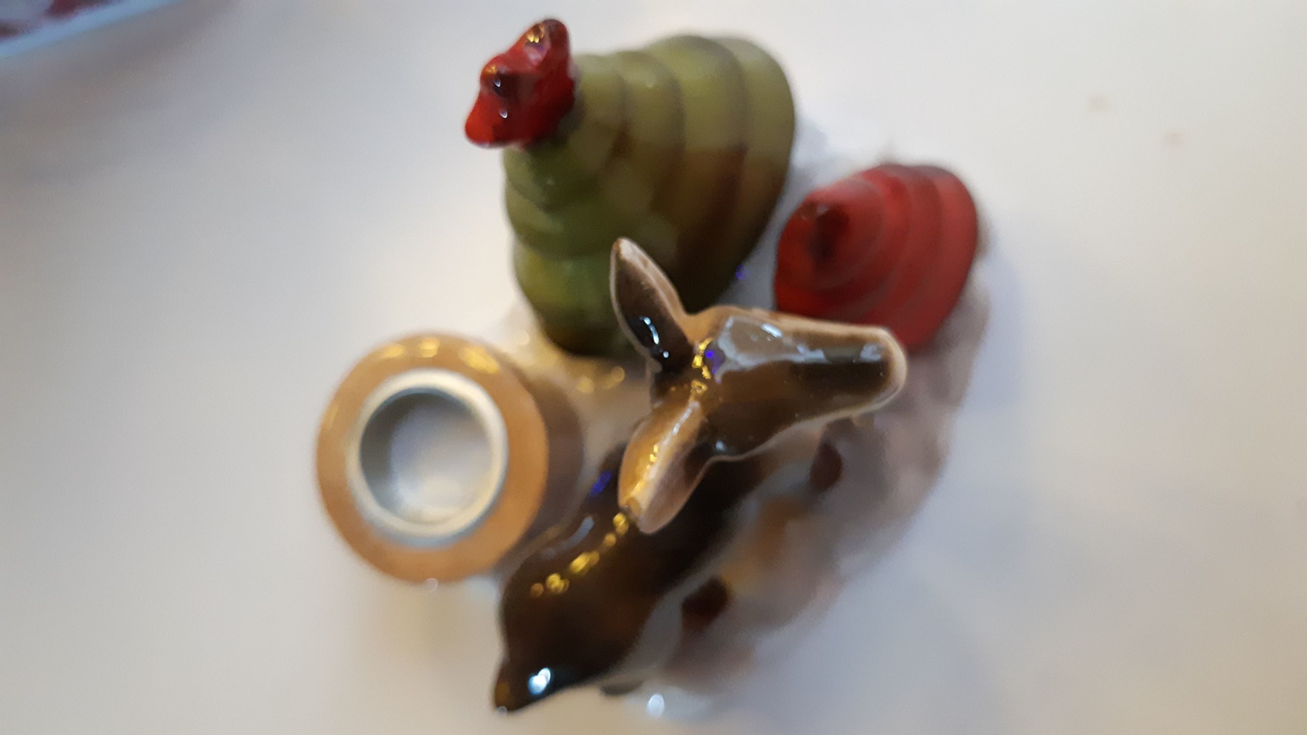 Фотография покупателя товара Сувенир керамика подсвечник "Оленёнок с ёлочками (зелёная и красная)" 11,8х9х11,8 см - Фото 2