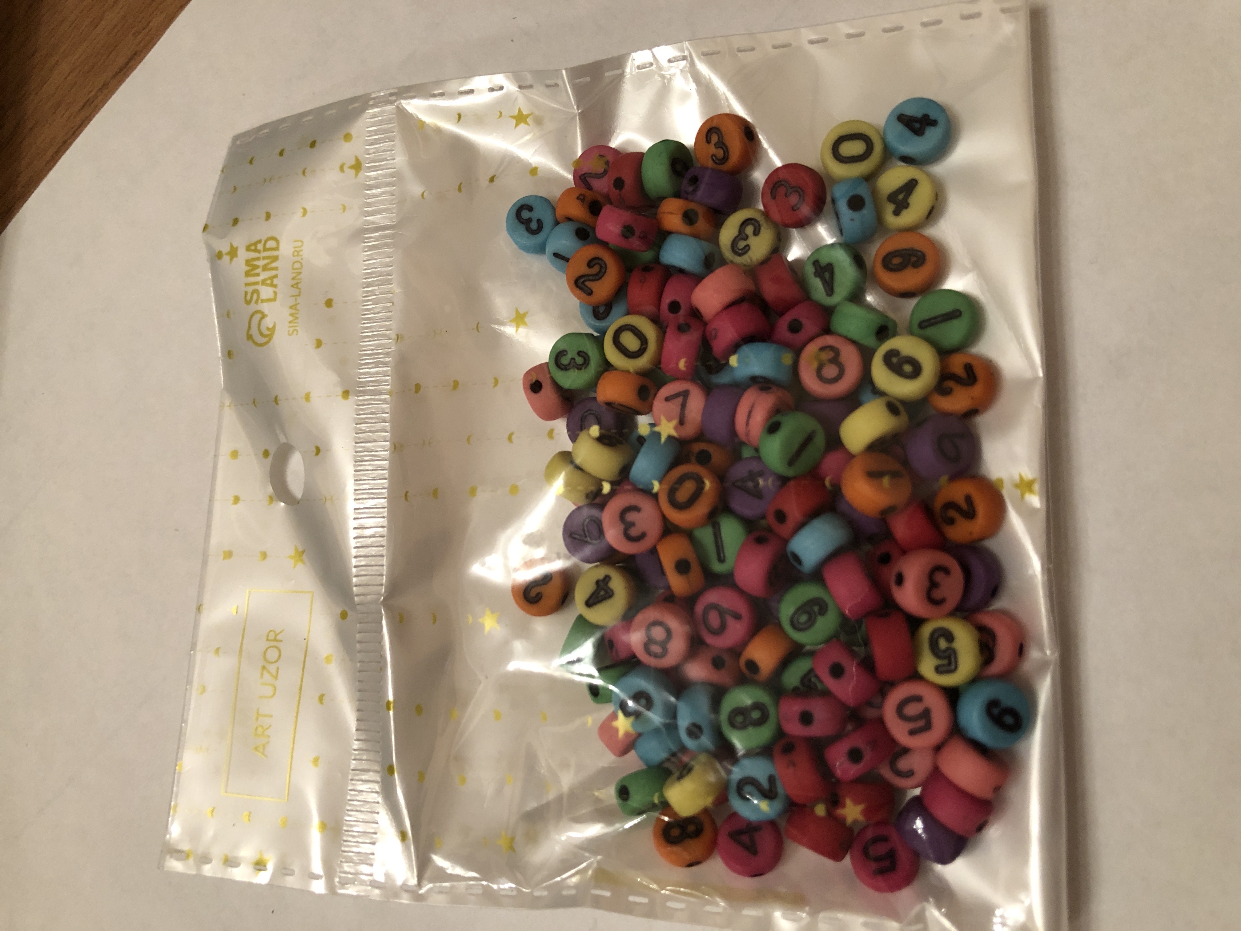 Фотография покупателя товара Бусины для творчества пластик "Разноцветные цифры" набор 20 гр 0,7х0,7 см