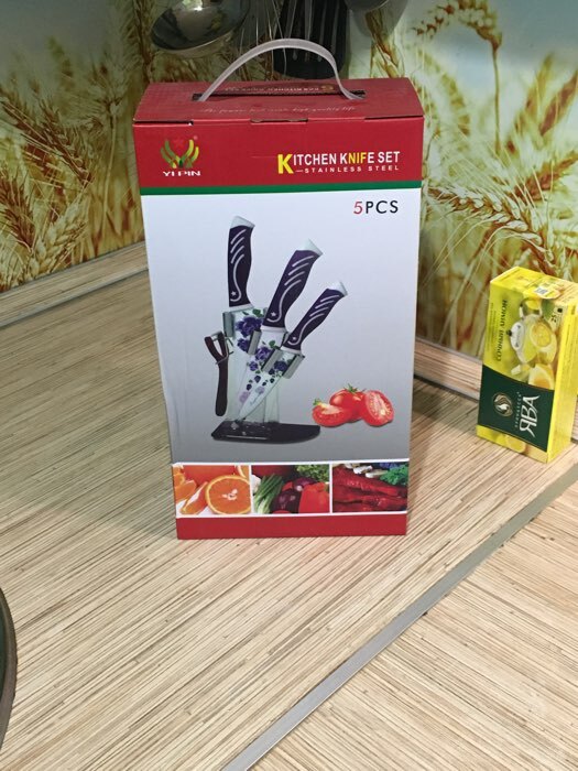 Фотография покупателя товара Набор кухонных принадлежностей на подставке «Цветок солнца», 4 предмета: ножи 17 см, 14 см, 12 см, овощечистка, цвет зелёный - Фото 3