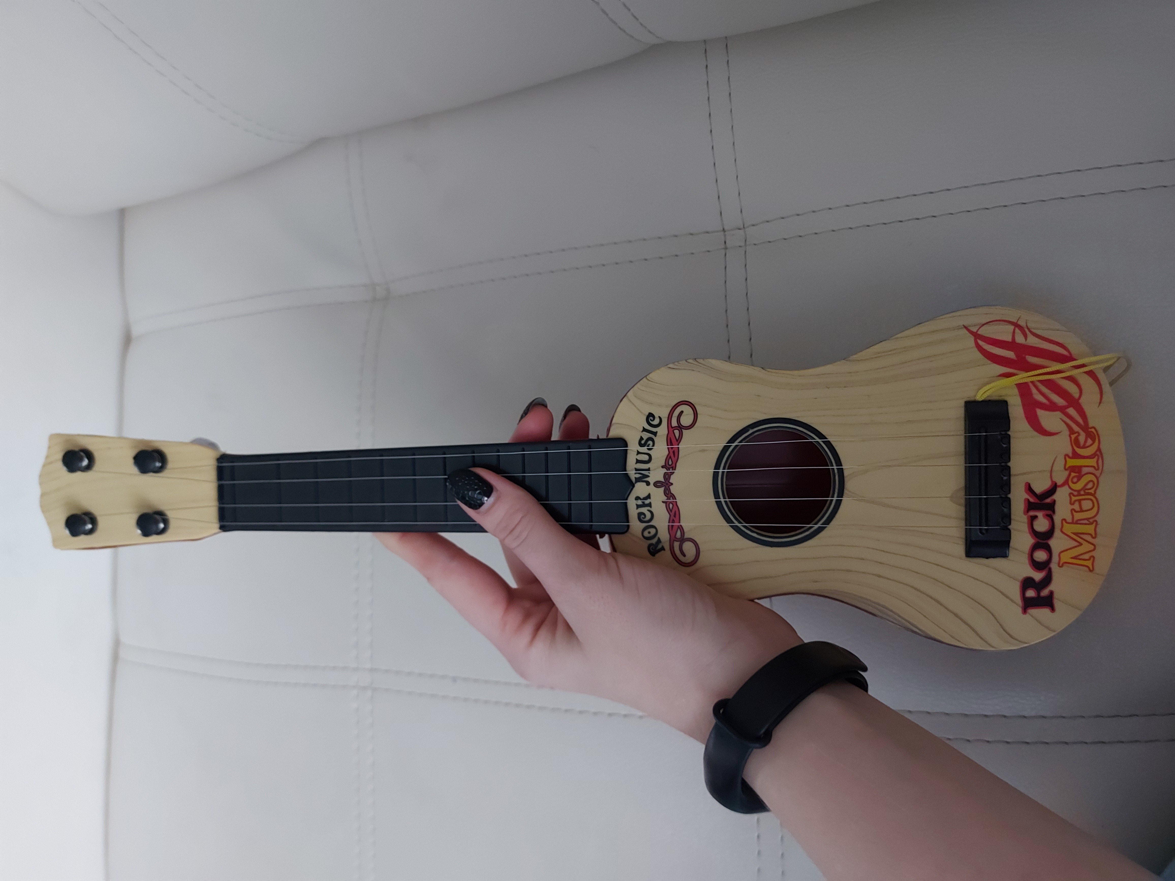 Фотография покупателя товара Детский музыкальный инструмент «Гитара: Классика», цвета МИКС - Фото 4