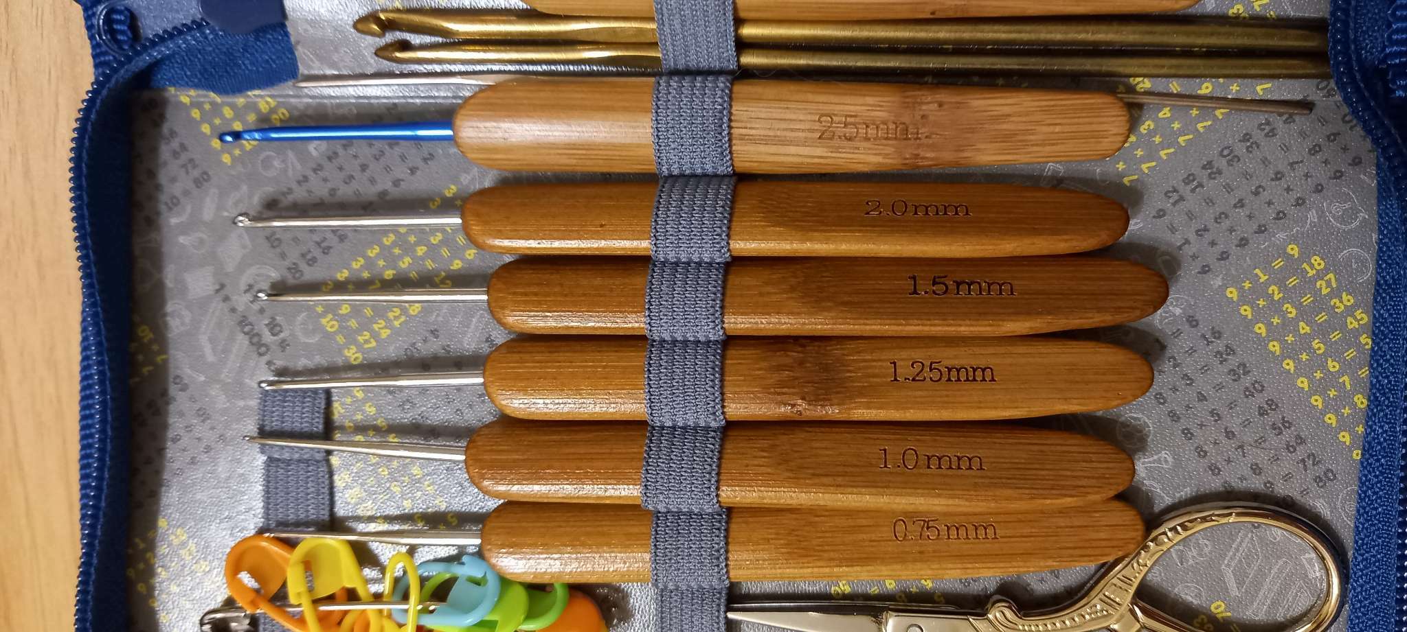 Фотография покупателя товара Набор крючков для вязания, с бамбуковыми ручками, d = 0,75/1/1,25/1,5/2 мм, 13,5 см, 5 шт - Фото 1