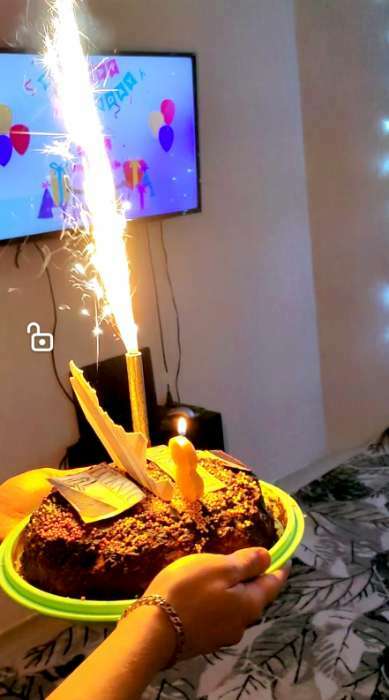 Фотография покупателя товара Свеча для торта цифра "Грань + фонтан" золотая "9" - Фото 2