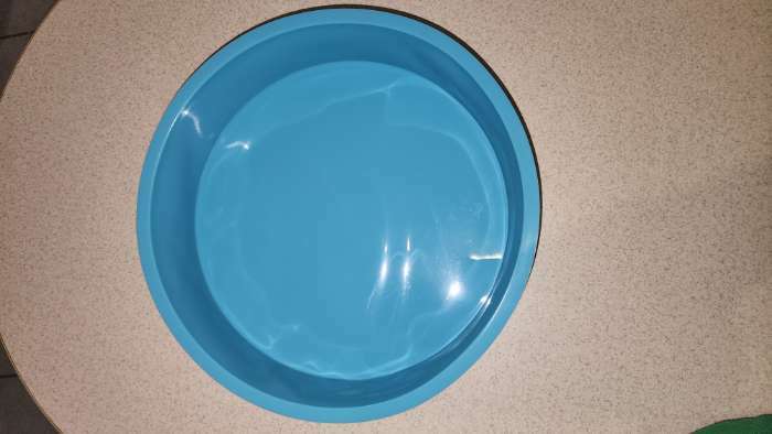 Фотография покупателя товара Форма для выпечки Доляна «Круг», силикон, 24×5 см, диаметр дна 21,5 см, цвет МИКС - Фото 11