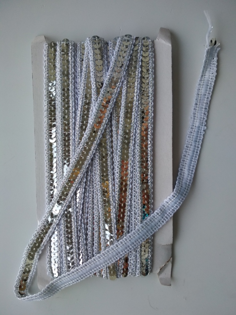 Фотография покупателя товара Тесьма декоративная с пайетками, 12 мм, 9 ± 0,5 м, цвет серебряный