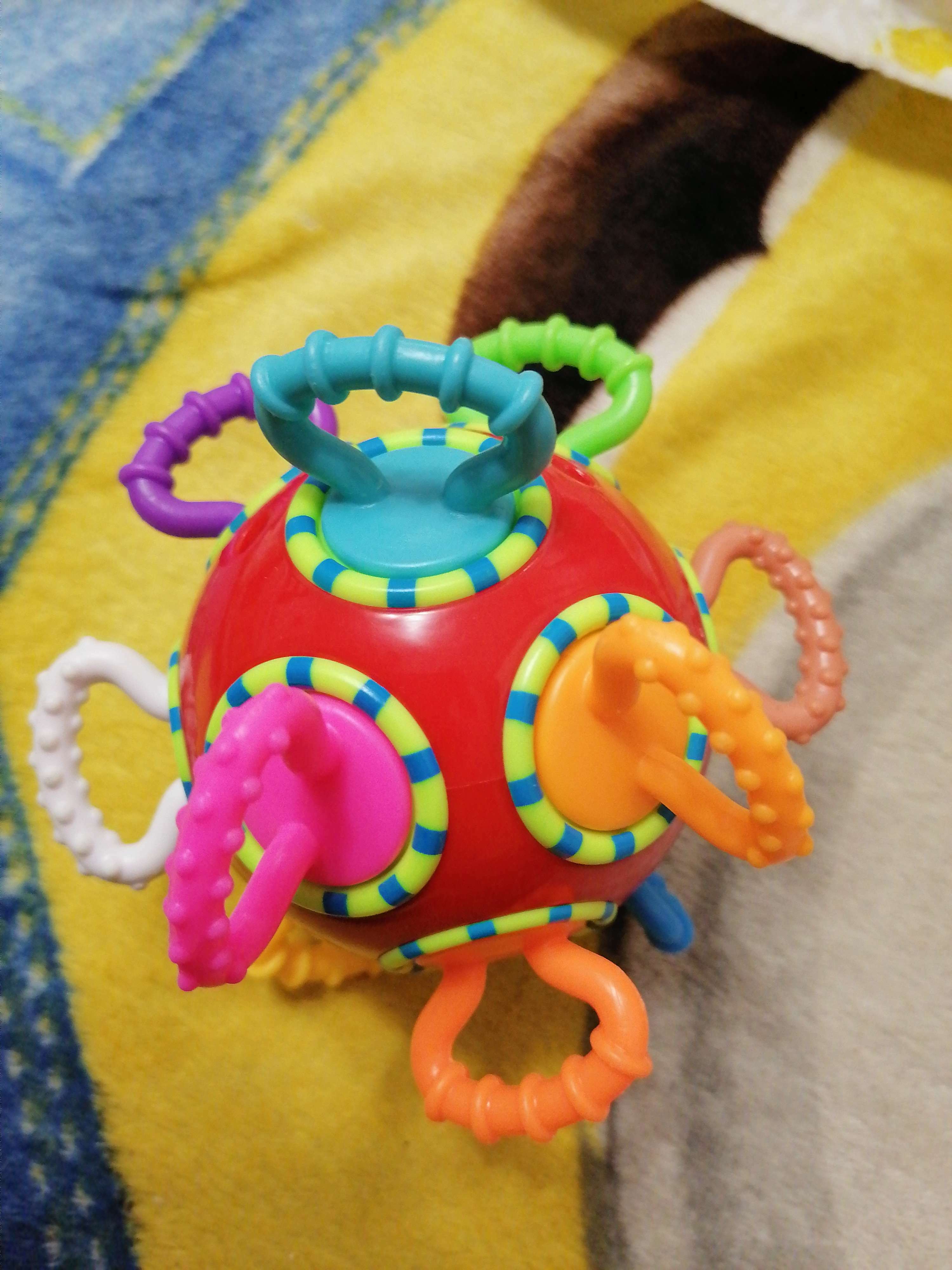 Фотография покупателя товара Развивающая игрушка погремушка - трещотка «Шар», цвет МИКС, Крошка Я - Фото 2