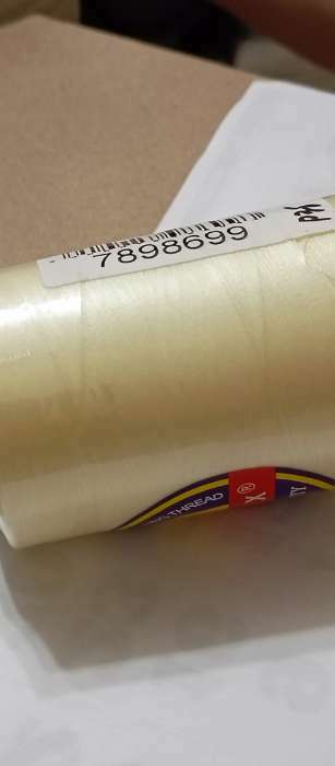 Фотография покупателя товара Нитки промышленные 50/2, для тонких тканей, 5000 ярд (002 бело-жёлтый) - Фото 3