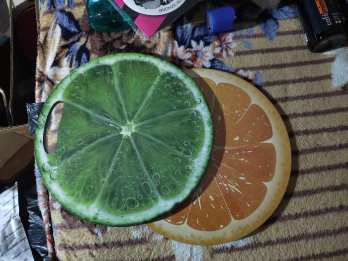Фотография покупателя товара Доска разделочная и сервировочная круглая кухонная "Апельсин в разрезе", 25,5 см - Фото 2