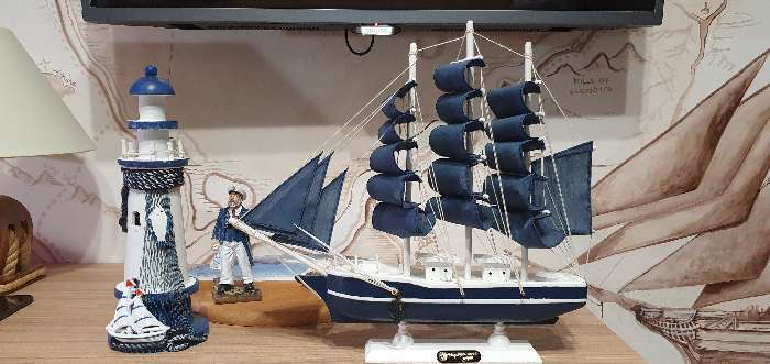 Фотография покупателя товара Корабль сувенирный средний «Калева», борта синие с белой полосой, паруса синие, 30х7х32 см - Фото 3