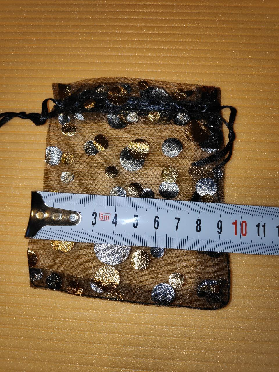 Фотография покупателя товара Мешочек подарочный «Пузырьки», 10×12, цвет чёрно-золотой