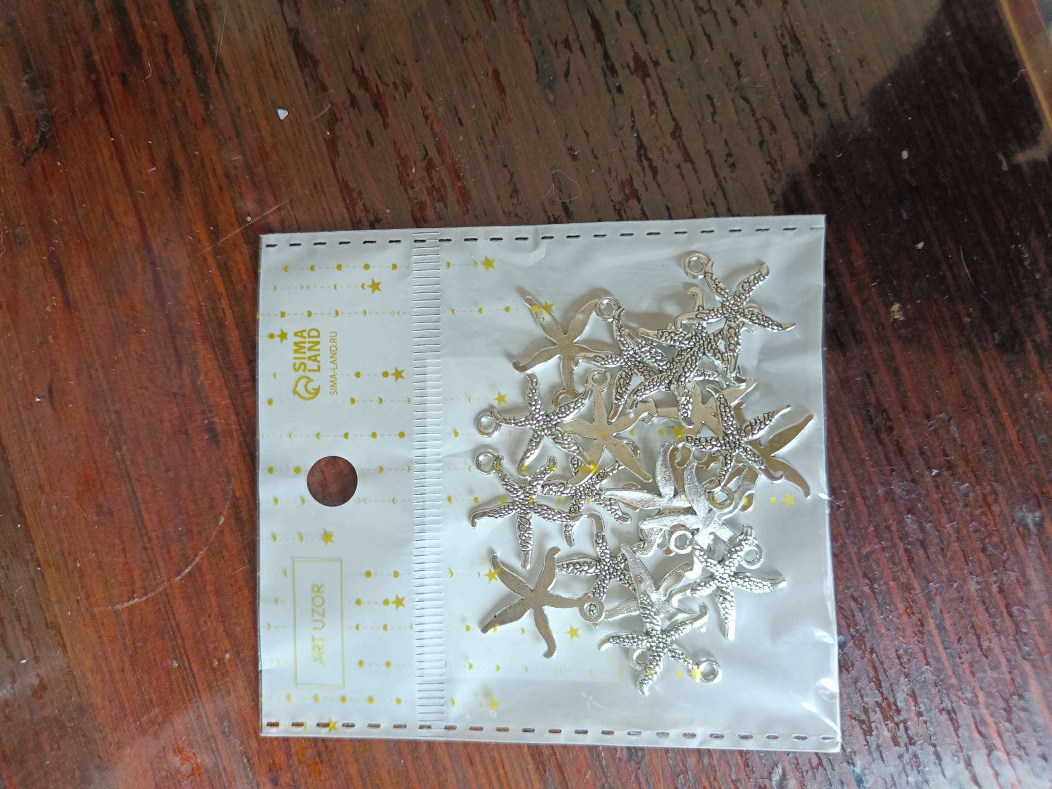 Фотография покупателя товара Декор металл для творчества "Танцующая морская звезда" серебро 2117 1,8х1,7 см - Фото 1