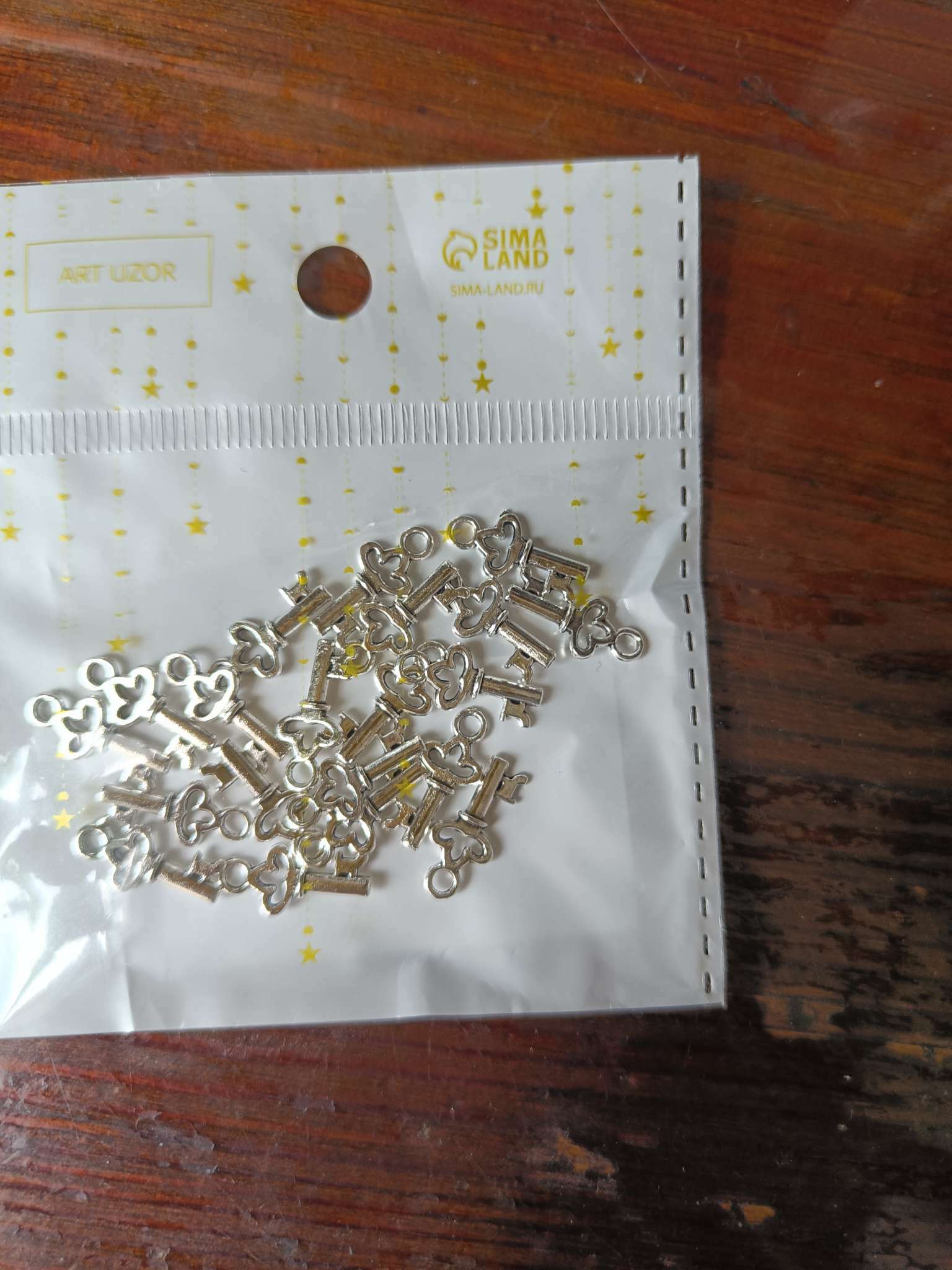 Фотография покупателя товара Декор для творчества металл "Маленький ключик" серебро 1,5х0,7 см