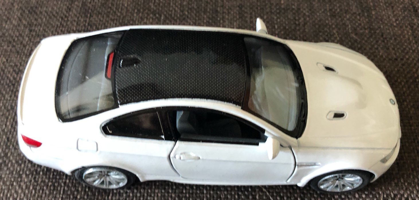 Фотография покупателя товара Машина металлическая BMW M3 Coupe, масштаб 1:36, открываются двери, инерция, цвет красный - Фото 3