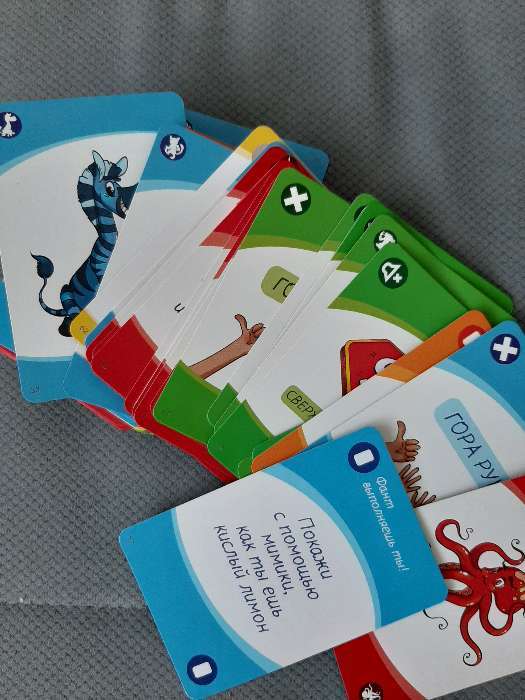 Фотография покупателя товара Настольная игра на реакцию и внимание «UMO momento. Kids», 70 карт, 4+ - Фото 3