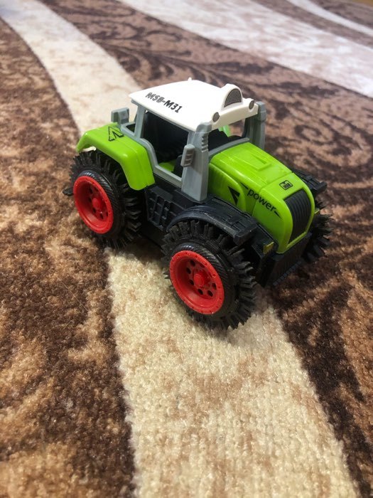 Фотография покупателя товара Трактор-перёвертыш «Хозяин фермы», работает от батареек, цвета МИКС, уценка - Фото 14