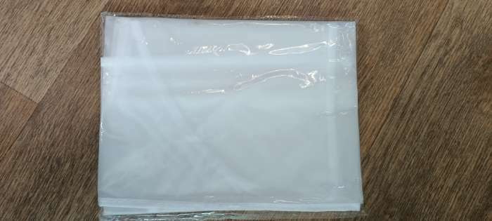 Фотография покупателя товара Чехол для одежды Доляна, плотный, 60×80 см, цвет белый - Фото 3