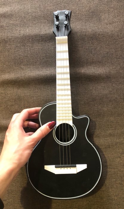 Фотография покупателя товара Игрушка музыкальная гитара «Музыкальный Бум»