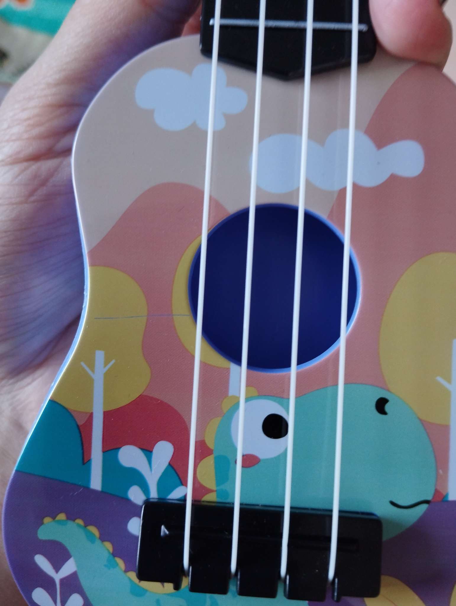 Фотография покупателя товара Игрушка музыкальная - гитара «Динозаврик», цвета МИКС - Фото 1