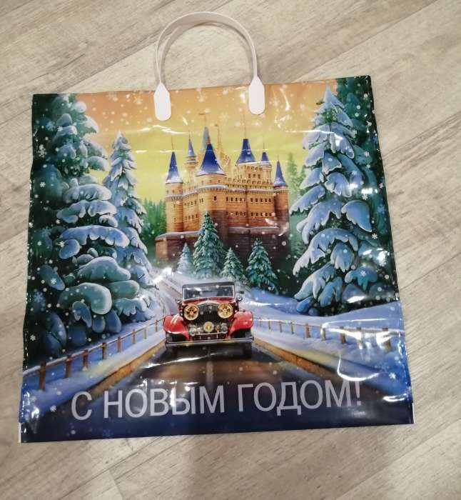 Фотография покупателя товара Пакет новогодний «Рождественские бантики», полиэтиленовый с пластиковой ручкой, 38×35 см - Фото 2