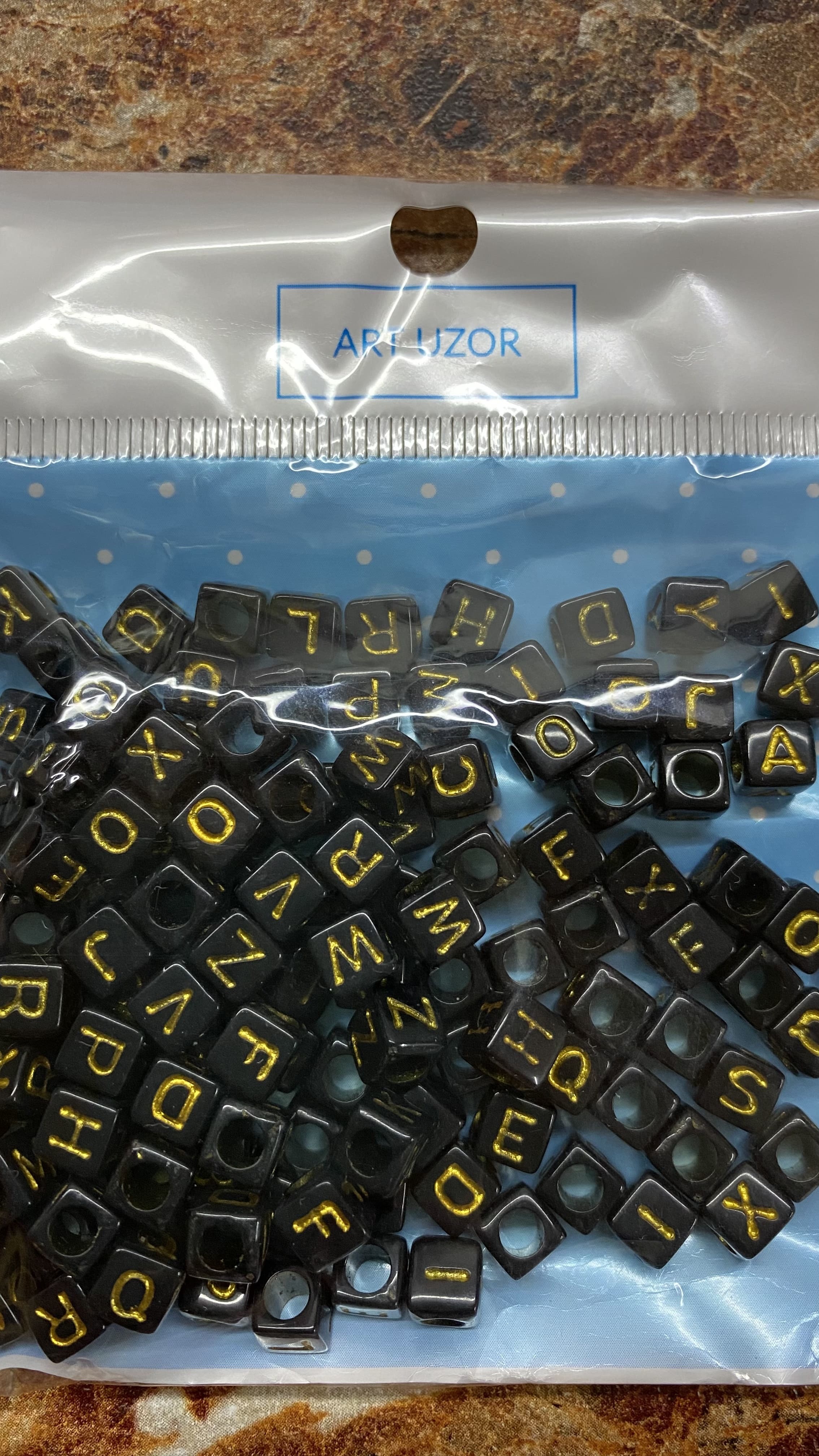 Фотография покупателя товара Бусины для творчества пластик "Английские буквы на кубике" чёрно-золот набор 20 гр 0,6х0,6 см   5194