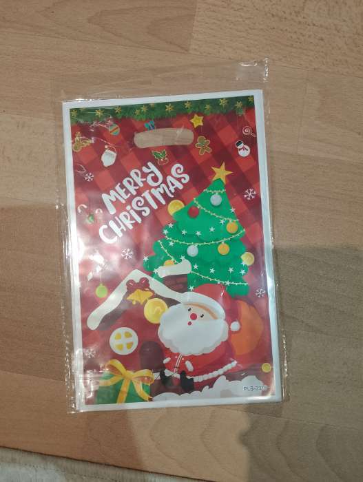 Фотография покупателя товара Пакет подарочный новогодний из жемчужной пленки, «Команда Санты», 17×25±1 см - Фото 4