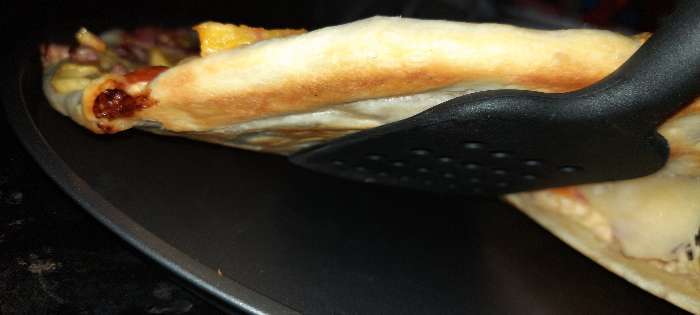 Фотография покупателя товара Форма для пиццы Доляна «Жаклин», d=35 см, антипригарное покрытие, цвет чёрный - Фото 6