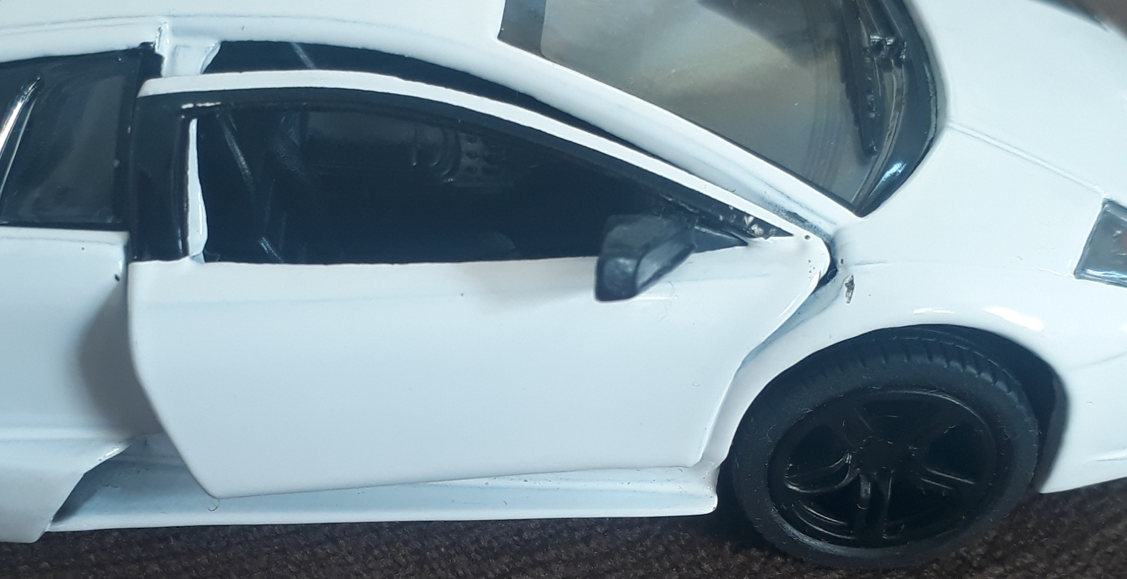 Фотография покупателя товара Машина металлическая Lamborghini Murcielago LP640, масштаб 1:36, открываются двери, инерция, цвет белый - Фото 1